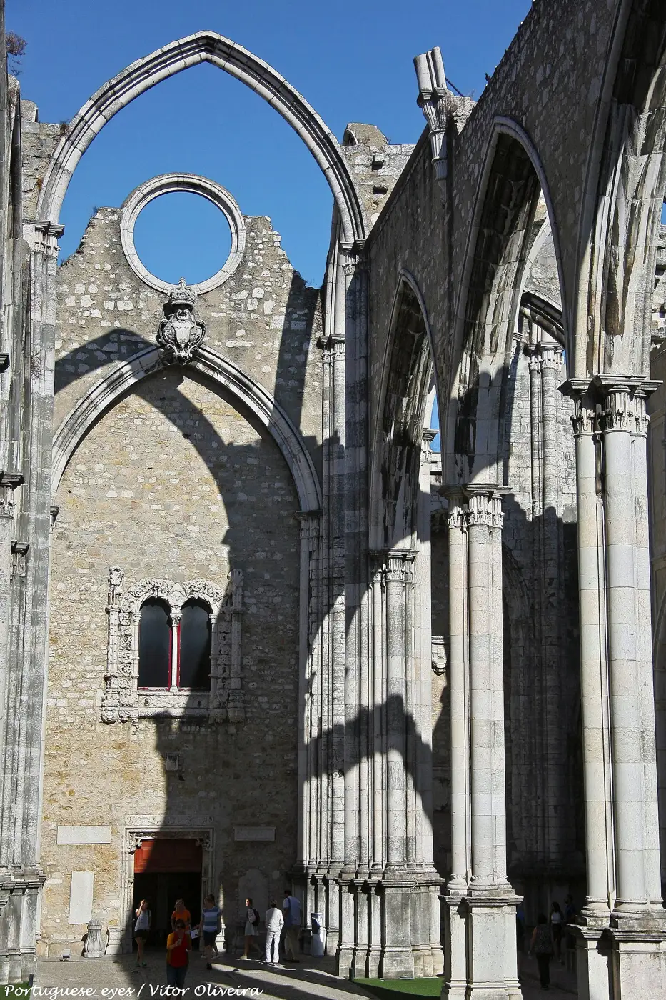Gothic arches of the roofless Convento do Carmo ruin in Lisbon