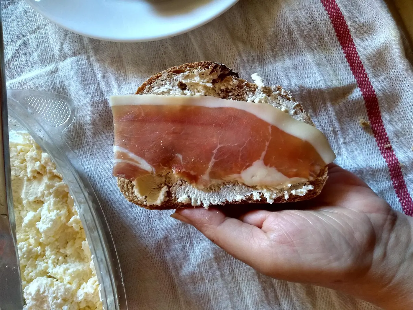 Montenegrin pršut on bread with kajmak, a classic local snack