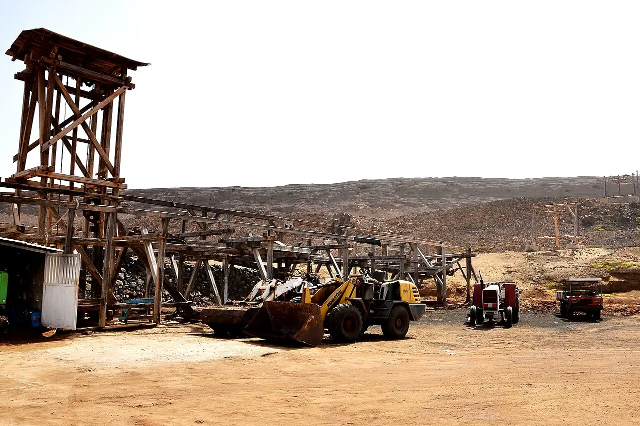 Old wooden salt-loading structures at the Pedra de Lume salt crater, Sal