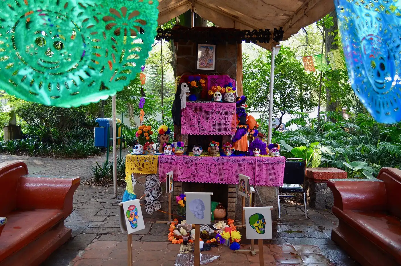 Día de Muertos ofrenda with skulls and papel picado in Coyoacán, Mexico City